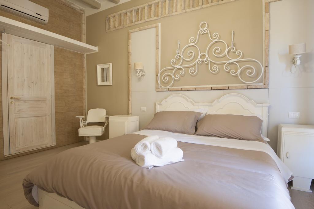 Cento Suites Cagliari Værelse billede